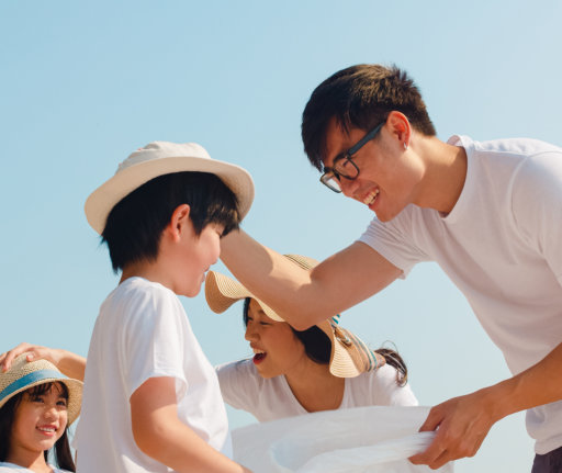 man put holding the head of children