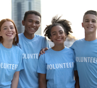 young people volunteer t-shirts posing camera, social teamwork, help