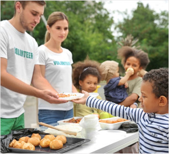 man giving food to kid