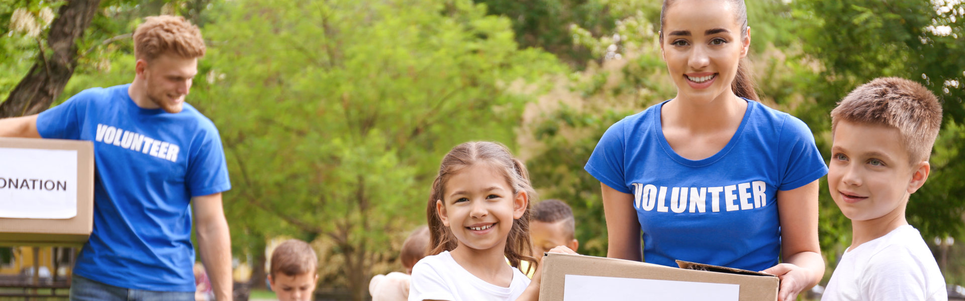 woman and kid carring box